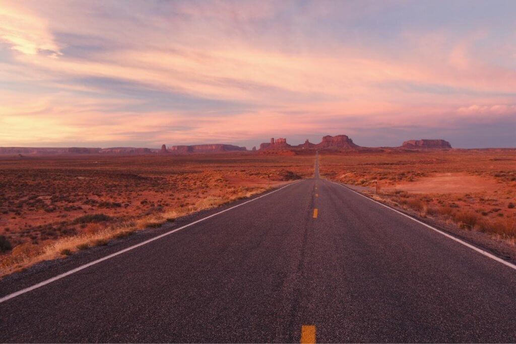 open road towards monument valley
