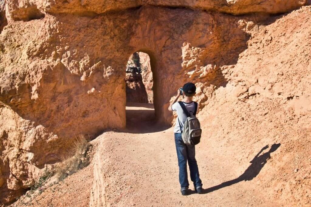 4th grader child taking a photo in a National Park
