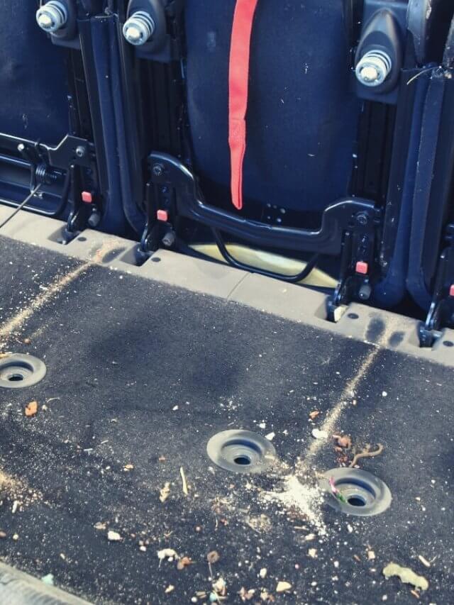 Messy interior of a car before it is cleaned